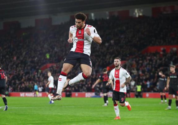Daily Echo: Che Adams celebrates scoring against Lincoln. Daily Echo: Che Adams celebrates scoring against Lincoln.