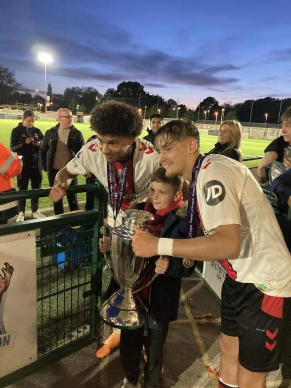 Daily Echo: Dom Ballard and Kami Doyle take a picture with a young Saints fan. Daily Echo: Dom Ballard and Kami Doyle take a picture with a young Saints fan.