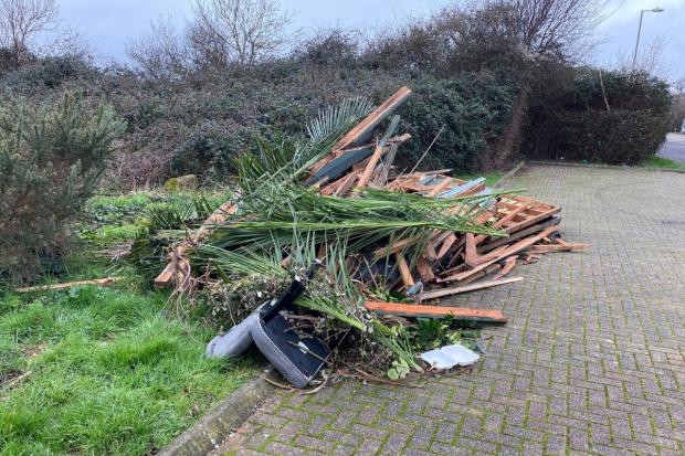 A large pile of wooden pallets and branches were dumped in Ensign Way in Hamble