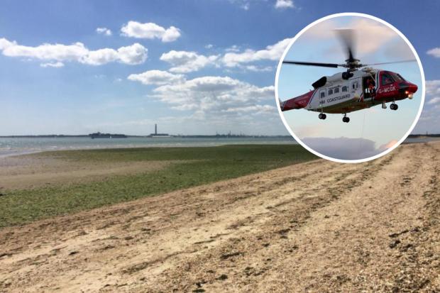 The woman was spotted by police off Meon Shore and rescued by the coastguard