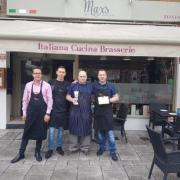 Max's Braserie staff outside the restaurant on Oxford Street.
