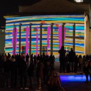 Lighten up 2 a live light art projection event in Southampton Guildhall Square- projecting images onto buildings..