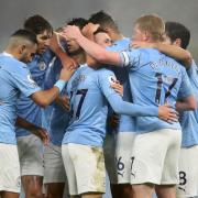 Manchester City's Phil Foden (centre) celebrates with his team-mates after scoring his side's first goal of the game during the Premier League match at Etihad Stadium, Manchester. PA Photo. Picture date: Wednesday January 13, 2021. See PA story