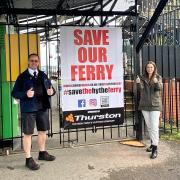 Lee Rayment and Ashleigh Mutimear with one of the new Save Our Ferry banners.