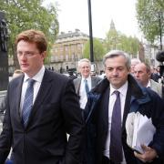 Liberal Democrats Chris Huhne (right) and Danny Alexander at the Cabinet Office as negotiations with the Conservatives continue