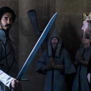 Dev Patel (left) and Sean Harris (right) in The Green Knight (PA Features Archive/Press Association Images)