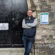 Phallic drawing and obscenity scrawled on church door are proving costly