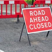 Heavy delays as road closed after incident - live updates