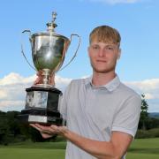 Stoneham’s James Freeman with the Sloane-Stanley Challenge Cup after winning  117th Hampshire, Isle of Wight and Channel Islands Amateur Championship final beating Bramsahw’s Joe Buenfeld at the 21st hole, at Stoneham Golf Club on Sunday, May