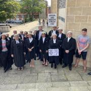 Barristers gathered outside Winchester Crown Court