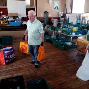 Volunteers work to feed Sotonians at Southampton City Missions' Basics Bank.