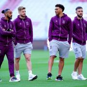 Southampton's Che Adams (second right), Theo Walcott, Stuart Armstrong and Adam Armstrong inspect the pitch ahead of a Premier League match. Picture date: Friday September 16, 2022.