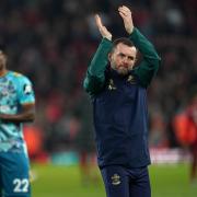 Southampton manager Nathan Jones applauds the fans following the Premier League match at Anfield, Liverpool. Picture date: Saturday November 12, 2022.