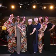 Sandy takes centre stage at one of her Ladies Let's Lunch charity fashion events at The Concorde Club