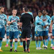 Southampton players appeal to referee Michael Oliver against a penalty decision