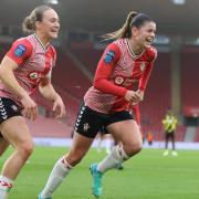Megan Collett celebrates giving Saints FC Women the lead against Watford.