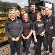 Wayne and Joanne FitzGerald with some of the 16 staff at Tilley's Bakery in Hythe