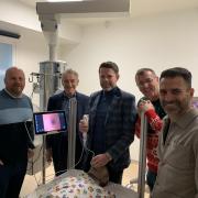 Ex Saints board members during a visit to Southampton's Paediatric Intensive Care Unit (PICU) where they presented a cheque for £5,000