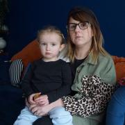 Carly Devon was shocked to find her daughter Wynnie, two, reading a 'scary' church booklet posted through their door