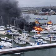 A boat caught fire at American Wharf on the River Itchen