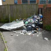 Rubbish left behind after cars move from car park after threat of being destroyed
