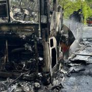 Firefighters tackle double-decker bus blaze