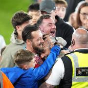 Saints manager Russell Martin celebrated with family after his side secured passage to a Wembley final