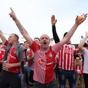 Saints fans outside St Mary's on Friday night before their play-off semi-final against West Bromwich Albion