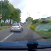 Dashcam footage shows vehicles illegally overtaking SUV by speeding in bus lane