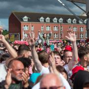 Saints fans celebrate promotion from the Championship at St Mary's Stadium.