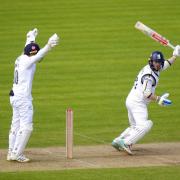 Hampshire's Ben Brown caught two Surrey batsman in the first innings before turning the bat on them