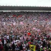 Saints fans celebrating promotion after beating Walsall on the final day in League One