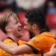 Raul Jimenez (right) earned Wolves a last-gasp win (Annabel Lee-Ellis/PA).