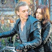 Jamie Campbell Bower with Lily Collins in The Mortal Instruments: City of Bones