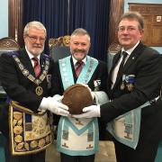 Mike Wilks (L), Grand Master of Hampshire and IOW Freemasons, David Lallana, master of Southampton football lodge and Tony Robinson of London Irish Rifles Lodge (R)