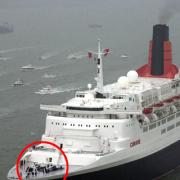 SECURED: QE2, with her two anchors circled.