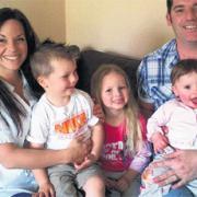 HOME AGAIN: Rachel Boulahri-Waite with partner Jason and children Maskah, Shaira and baby Baileah.
