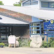 Swine virus teacher’s school will stay open