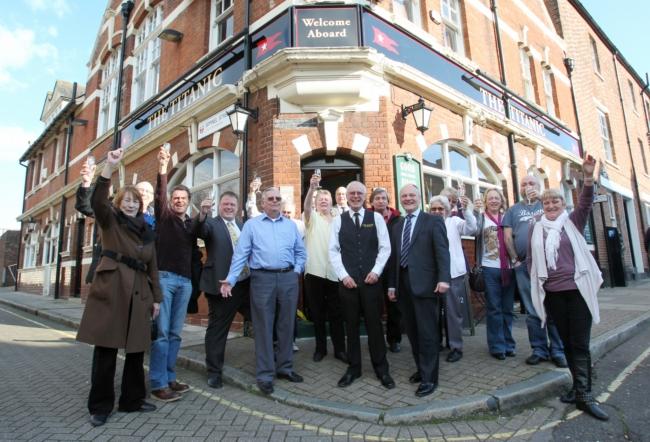 RELAUNCH: Martin Geer with Cllr Royston Smith and customers outside the pub
