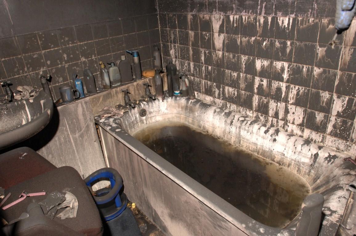 The bathroom of flat 72, where the first two firefighters who went in to fight the fire sought refuge from the heat.