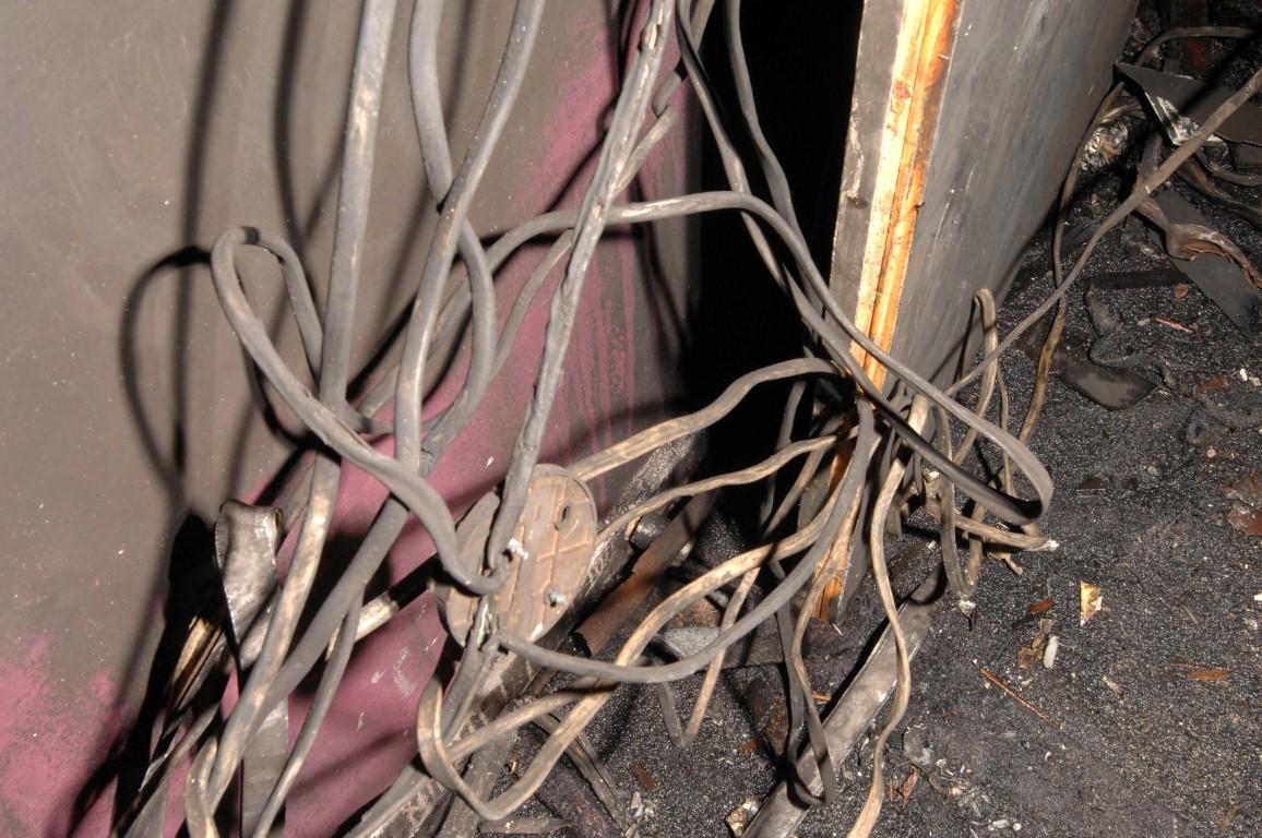 More of the fallen cabling which left firefighters tangled up as they tried to tackle the blaze and rescue their two colleagues who later died.