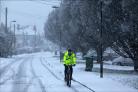 A cyclist battling through the snow in Southampton