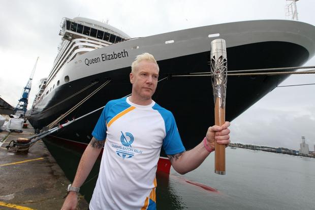A file photo of Iwan Thomas with the Queen's Baton at Queen Elizabeth in Southampton