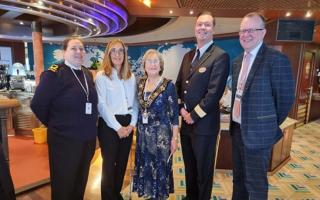 The Lord  Mayor, Valerie Laurent, centre, with hotel manager Paul Goodenough at the charity event