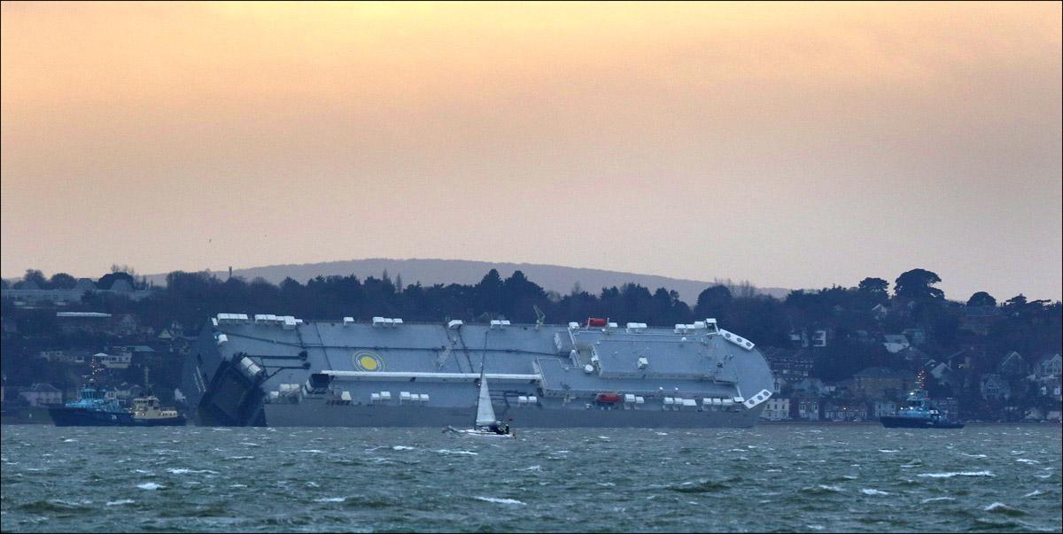 LATEST IMAGES - the Hoegh Osaka ship is now on the move after running aground at Brambles Bank of the Isle of Wight - January 7, 2015. Picture by Robin Jones