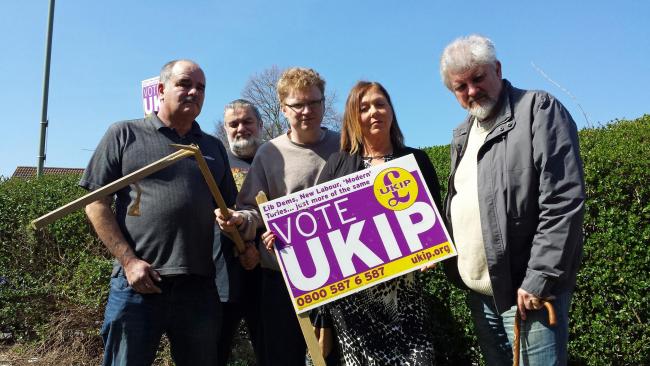(L-r) Andy Moore, Chris Lagdon, Jim Saunders, Patricia Culligan and Glynn Davies-Dear with the vandalised sign