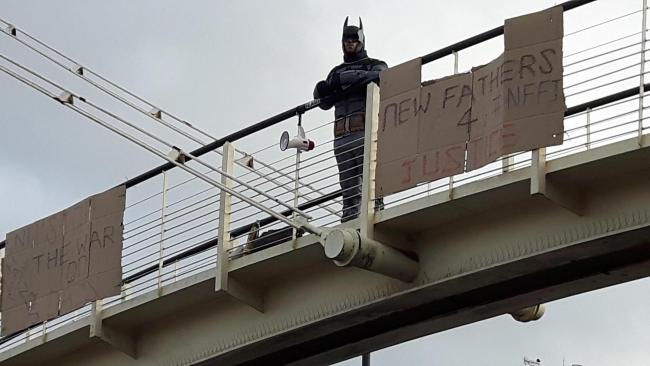 The protestor on the bridge this afternoon